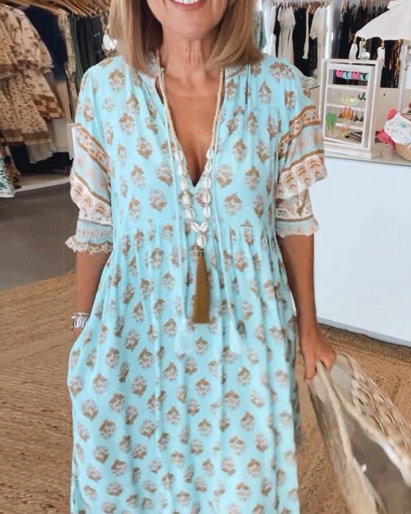 MANA | VESTIDO MIDI FLORAL CHIC CON ESCOTE EN V